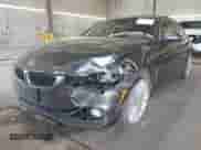 2015 BMW 4 Series 428i xDrive with VIN WBA4A7C52FD414734, listed as a IAAI auction lot 42377682 with 129,264 mi miles and . Bid and sale history available at DreamBid. Image 2.