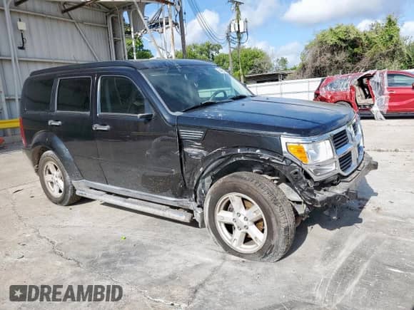 2008 Dodge Nitro SXT с VIN 1D8GT28K88W262446, выставлен на аукционе Copart как лот 64495145 с пробегом 144 668 миль миль и Списание • Salvage title. История ставок и продаж доступна на DreamBid. Изображение 4.