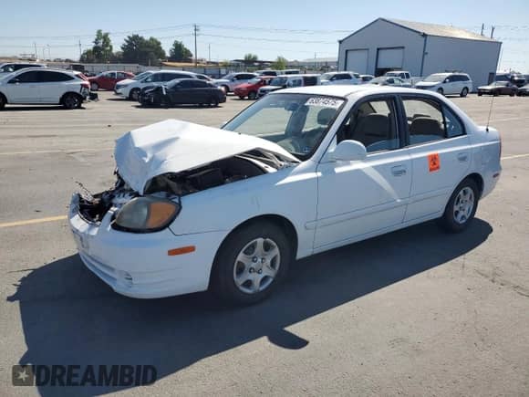 2003 Hyundai Accent GL z VIN KMHCG45C73U427901, wystawiony jako Copart lot #63874575 z przebiegiem 134 268 mil mil oraz Szkoda całkowita • Salvage title. Historia ofert i sprzedaży dostępna na DreamBid. Obrazek 1.