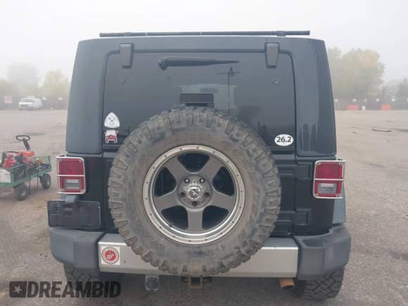 2008 Jeep Wrangler Unlimited Sahara with VIN 1J4GA59158L636793, listed as a IAAI auction lot 43466197 with 239,794 mi miles and . Bid and sale history available at DreamBid. Image 16.