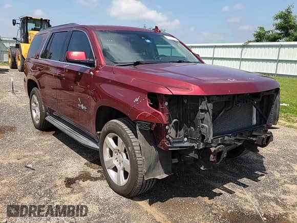 2016 Chevrolet Tahoe LT with VIN 1GNSCBKCXGR311662, listed as a Copart auction lot 65987115 with 168,117 mi miles and Salvage title. Bid and sale history available at DreamBid. Image 15.