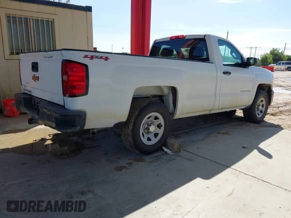 2014 Chevrolet Silverado 1500 Work Truck with VIN 1GCNKPEC1EZ329465, listed as a IAAI auction lot 43564234 with 143,198 mi miles and . Bid and sale history available at DreamBid. Image 4.