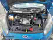 2015 Ford Fiesta SE z VIN 3FADP4BEXFM216804, wystawiony jako Copart lot #51219215 z przebiegiem 80 339 mil mil oraz Czysty tytuł • Clean title. Historia ofert i sprzedaży dostępna na DreamBid. Obrazek 11.