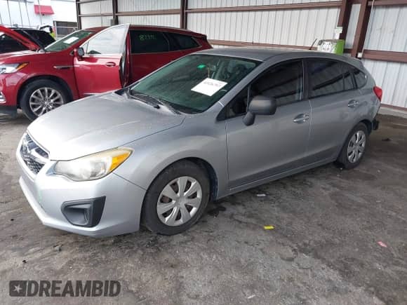 2012 Subaru Impreza 2.0i z VIN JF1GPAA62CH241637, wystawiony jako IAAI lot #42426797 z przebiegiem 109 827 mil mil oraz . Historia ofert i sprzedaży dostępna na DreamBid. Obrazek 2.