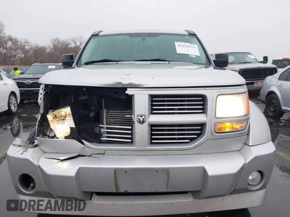 2011 Dodge Nitro Detonator with VIN 1D4PT6GX0BW500626, listed as a IAAI auction lot 41156574 with 152,833 mi miles and . Bid and sale history available at DreamBid. Image 12.