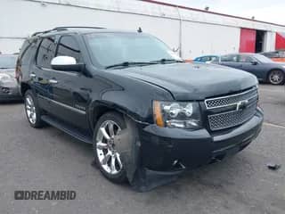 2013 Chevrolet Tahoe LTZ с VIN 1GNSKCE07DR180583, выставлен на аукционе IAAI как лот 43188165 с пробегом 148 943 миль миль и . История ставок и продаж доступна на DreamBid. Изображение 1.