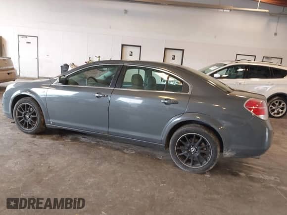 2009 Saturn Aura XE with VIN 1G8ZS57B69F214615, listed as a IAAI auction lot 43260082 with 162,180 mi miles and . Bid and sale history available at DreamBid. Image 3.