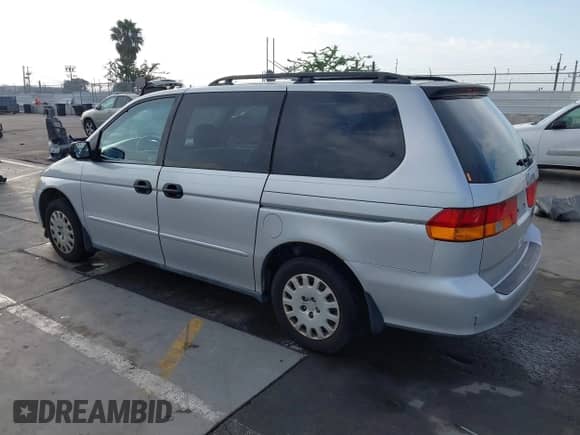 2004 Honda Odyssey LX with VIN 5FNRL18524B042391, listed as a IAAI auction lot 43280655 with 165,252 mi miles and . Bid and sale history available at DreamBid. Image 3.