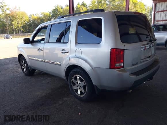 2009 Honda Pilot Touring with VIN 5FNYF48929B004092, listed as a IAAI auction lot 43116551 with 232,447 mi miles and . Bid and sale history available at DreamBid. Image 3.