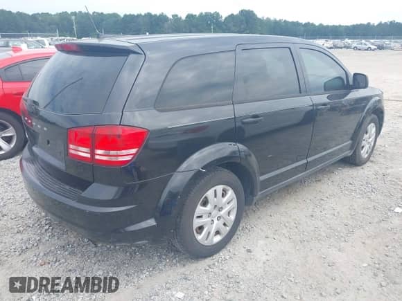 2013 Dodge Journey American Value z VIN 3C4PDCAB1DT695392, wystawiony jako IAAI lot #43098134 z przebiegiem 209 536 mil mil oraz . Historia ofert i sprzedaży dostępna na DreamBid. Obrazek 4.