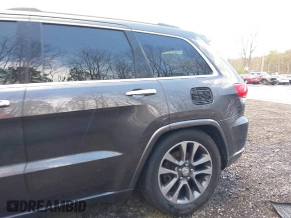 2018 Jeep Grand Cherokee Overland with VIN 1C4RJFCG7JC341816, listed as a IAAI auction lot 42031339 with 111,333 mi miles and . Bid and sale history available at DreamBid. Image 19.