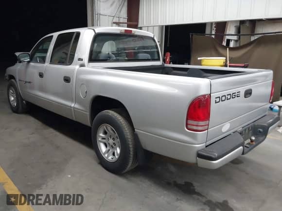 2001 Dodge Dakota Sport with VIN 1B7GL2AX01S123347, listed as a IAAI auction lot 42872308 with 161,373 mi miles and . Bid and sale history available at DreamBid. Image 3.
