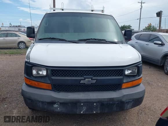 2014 Chevrolet Express Cargo with VIN 1GCWGGBA8E1122630, listed as a IAAI auction lot 42695749 with 208,291 mi miles and . Bid and sale history available at DreamBid. Image 12.