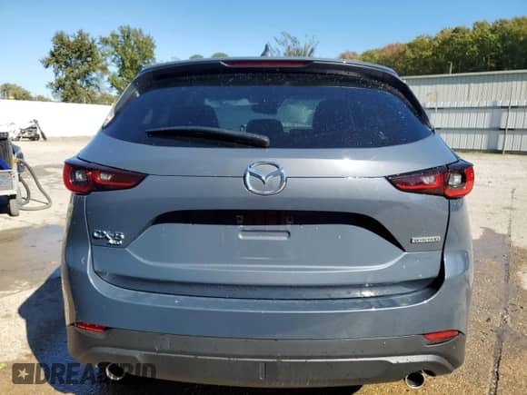 2025 Mazda CX-5 S Carbon Edition z VIN JM3KFBCM6S0679834, wystawiony jako Copart lot #87410845 z przebiegiem 13 497 mil mil oraz Czysty tytuł • Clean title. Historia ofert i sprzedaży dostępna na DreamBid. Obrazek 6.