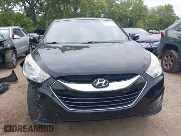 2012 Hyundai Tucson GLS with VIN KM8JU3ACXCU519889, listed as a IAAI auction lot 43041175 with 157,398 mi miles and . Bid and sale history available at DreamBid. Image 12.