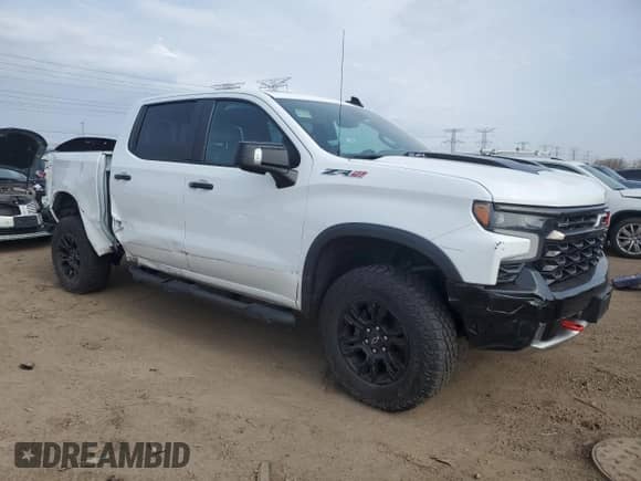 2023 Chevrolet Silverado 1500 ZR2 with VIN 3GCUDHEL5PG153230, listed as a Copart auction lot 54396335 with 46,887 mi miles and Salvage title. Bid and sale history available at DreamBid. Image 4.