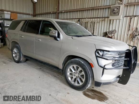 2021 Chevrolet Tahoe Premier with VIN 1GNSKSKD9MR213309, listed as a Copart auction lot 56747575 with 114,639 mi miles and Salvage title. Bid and sale history available at DreamBid. Image 4.