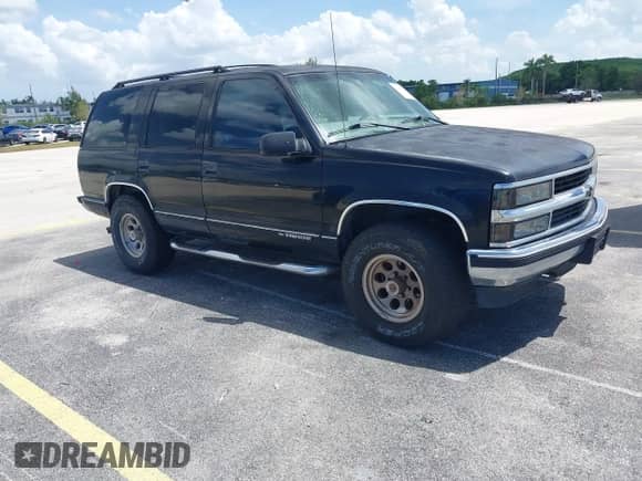 1998 Chevrolet Tahoe with VIN 1GNEK13R4WR110917, listed as a IAAI auction lot 43067584 with 240,529 mi miles and . Bid and sale history available at DreamBid. Image 1.
