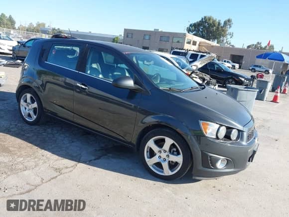 2015 Chevrolet Sonic LTZ with VIN 1G1JE6SB6F4125831, listed as a IAAI auction lot 43364524 with 152,774 mi miles and . Bid and sale history available at DreamBid. Image 1.