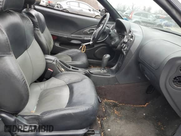 2001 Hyundai Tiburon с VIN KMHJG35F31U224416, выставлен на аукционе Copart как лот 83243684 с пробегом 59 473 миль миль и Списание • Salvage title. История ставок и продаж доступна на DreamBid. Изображение 7.