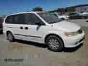 2000 Honda Odyssey LX с VIN 2HKRL1853YH501726, выставлен на аукционе Copart как лот 66131765 с пробегом 180 430 миль миль и Списание • Salvage title. История ставок и продаж доступна на DreamBid. Изображение 4.