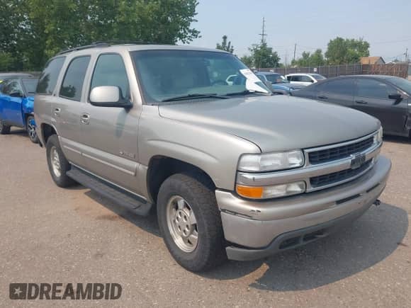 2000 Chevrolet Tahoe LS z VIN 1GNEK13T9YJ182631, wystawiony jako IAAI lot #42842446 z przebiegiem 263 731 mil mil oraz . Historia ofert i sprzedaży dostępna na DreamBid. Obrazek 1.