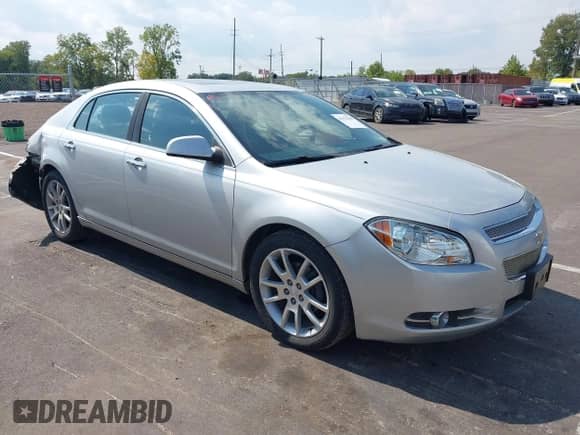 2012 Chevrolet Malibu LTZ z VIN 1G1ZG5E77CF182005, wystawiony jako IAAI lot #43173658 z przebiegiem 188 124 mil mil oraz . Historia ofert i sprzedaży dostępna na DreamBid. Obrazek 1.