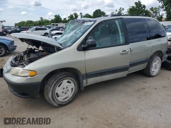 1999 Dodge Caravan SE with VIN 1B4GP45G7XB529075, listed as a Copart auction lot 60448215 with Not provided miles and Salvage title. Bid and sale history available at DreamBid. Image 1.