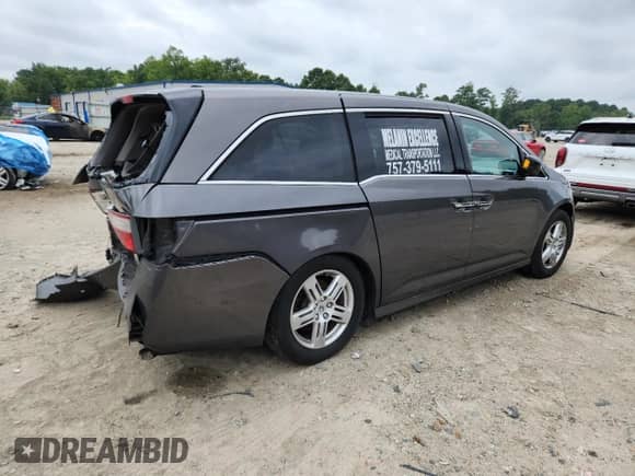 2012 Honda Odyssey Touring с VIN 5FNRL5H92CB077389, выставлен на аукционе Copart как лот 62778005 с пробегом 316 210 миль миль и Списание • Salvage title. История ставок и продаж доступна на DreamBid. Изображение 3.