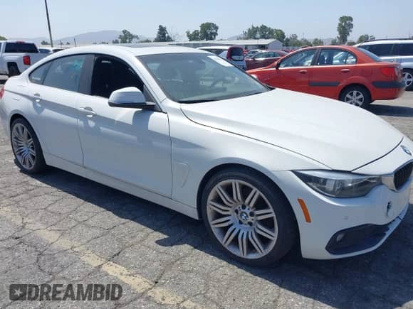 2018 BMW 4 Series 430i with VIN WBA4J1C59JBG77615, listed as a IAAI auction lot 42544193 with 58,445 mi miles and . Bid and sale history available at DreamBid. Image 1.