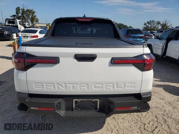 2024 Hyundai Santa Cruz SEL с VIN 5NTJC4DE5RH119902, выставлен на аукционе Copart как лот 71050654 с пробегом 2 758 миль миль и На запчасти • Non repairable. История ставок и продаж доступна на DreamBid. Изображение 6.