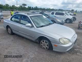 2000 Hyundai Sonata GLS z VIN KMHWF35V4YA338212, wystawiony jako IAAI lot #43339693 z przebiegiem 96 744 mil mil oraz . Historia ofert i sprzedaży dostępna na DreamBid. Obrazek 1.