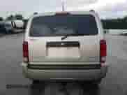 2010 Dodge Nitro SE with VIN 1D4PU2GK4AW126658, listed as a Copart auction lot 62361795 with 127,699 mi miles and Salvage title. Bid and sale history available at DreamBid. Image 6.