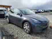 2023 Tesla Model Y Long Range z VIN 7SAYGDEE4PA147170, wystawiony jako Copart lot #48218945 z przebiegiem Nie podano mil oraz Szkoda całkowita • Salvage title. Historia ofert i sprzedaży dostępna na DreamBid. Obrazek 4.
