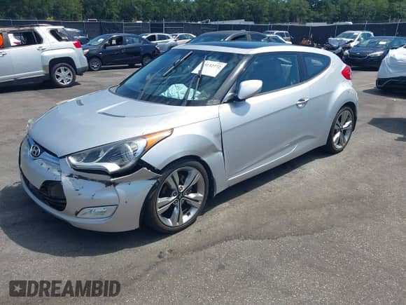 2012 Hyundai Veloster w/Gray Int z VIN KMHTC6AD0CU049684, wystawiony jako IAAI lot #43132772 z przebiegiem 114 146 mil mil oraz . Historia ofert i sprzedaży dostępna na DreamBid. Obrazek 17.