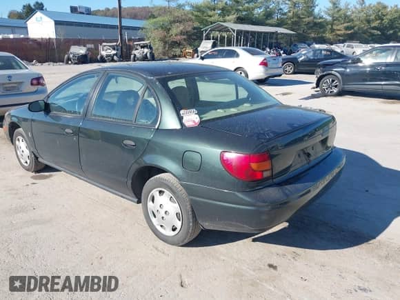 2000 Saturn SL with VIN 1G8ZG5286YZ236432, listed as a IAAI auction lot 43350377 with 146,104 mi miles and . Bid and sale history available at DreamBid. Image 3.