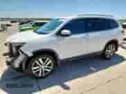 2017 Honda Pilot Touring с VIN 5FNYF5H91HB029652, выставлен на аукционе Copart как лот 66293335 с пробегом 63 291 миль миль и Чистый • Clean title. История ставок и продаж доступна на DreamBid. Изображение 1.