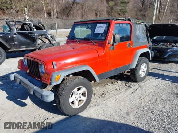 2006 Jeep Wrangler SE z VIN 1J4FA29S16P712101, wystawiony jako IAAI lot #41347042 z przebiegiem 129 063 mil mil oraz . Historia ofert i sprzedaży dostępna na DreamBid. Obrazek 2.