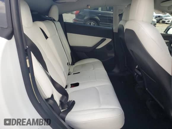 2022 Tesla Model Y Long Range with VIN 7SAYGDEE3NF355041, listed as a Copart auction lot 69226925 with 15,558 mi miles and Salvage title. Bid and sale history available at DreamBid. Image 10.