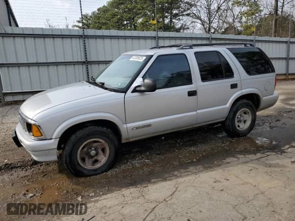 1997 Chevrolet Blazer LS z VIN 1GNCS13W2VK216755, wystawiony jako Copart lot #42385625 z przebiegiem 269 008 mil mil oraz Szkoda całkowita • Salvage title. Historia ofert i sprzedaży dostępna na DreamBid. Obrazek 1.