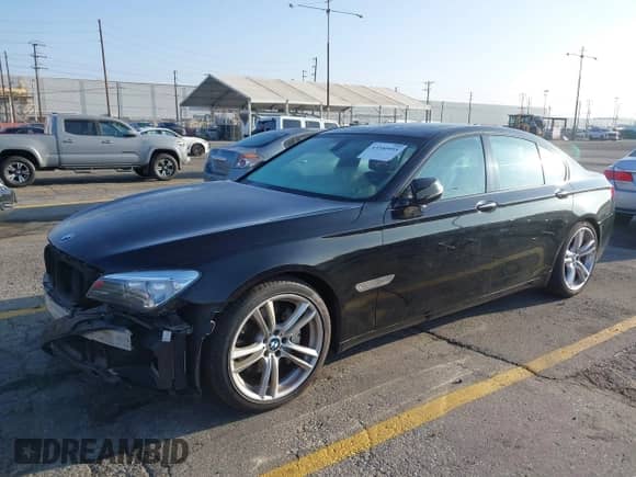 2014 BMW 7 Series 740i с VIN WBAYA6C57ED144071, выставлен на аукционе IAAI как лот 43340955 с пробегом 84 339 миль миль и . История ставок и продаж доступна на DreamBid. Изображение 2.