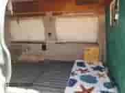 2002 Chevrolet Express с VIN 1GBFG15R221228585, выставлен на аукционе Copart как лот 63634835 с пробегом 197 718 миль миль и Списание • Salvage title. История ставок и продаж доступна на DreamBid. Изображение 11.