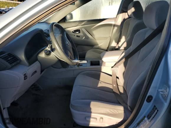 2007 Toyota Camry CE с VIN 4T1BE46KX7U713738, выставлен на аукционе Copart как лот 86875575 с пробегом 295 189 миль миль и Списание • Salvage title. История ставок и продаж доступна на DreamBid. Изображение 7.