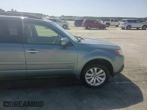 2013 Subaru Forester X Limited z VIN JF2SHAFC9DH413830, wystawiony jako Copart lot #61858345 z przebiegiem 145 162 mil mil oraz Szkoda całkowita • Salvage title. Historia ofert i sprzedaży dostępna na DreamBid. Obrazek 13.