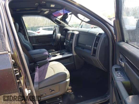 2018 Ram 1500 Rebel with VIN 1C6RR7YT4JS145768, listed as a IAAI auction lot 41593734 with 66,820 mi miles and . Bid and sale history available at DreamBid. Image 5.