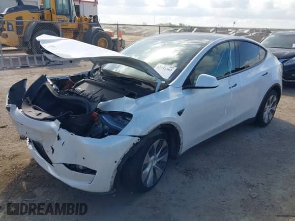 2022 Tesla Model Y Long Range z VIN 7SAYGDEEXNF353853, wystawiony jako IAAI lot #42792563 z przebiegiem 84 692 mil mil oraz . Historia ofert i sprzedaży dostępna na DreamBid. Obrazek 16.