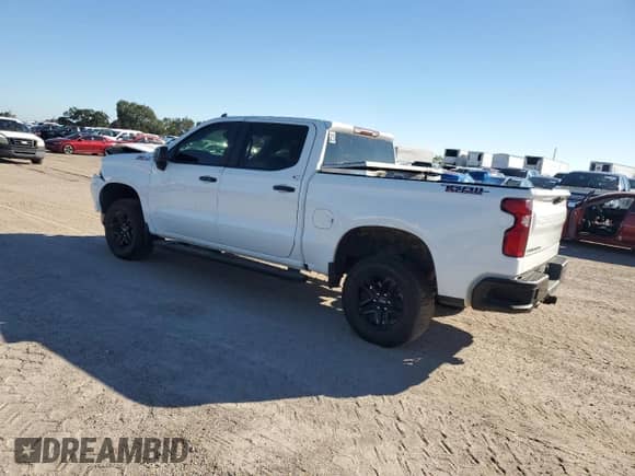 2023 Chevrolet Silverado 1500 LT Trail Boss z VIN 3GCUDFED8PG285668, wystawiony jako Copart lot #85270945 z przebiegiem 43 851 mil mil oraz Szkoda całkowita • Salvage title. Historia ofert i sprzedaży dostępna na DreamBid. Obrazek 2.