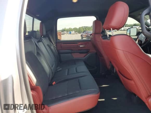 2020 Ram 1500 Rebel z VIN 1C6SRFLT7LN199084, wystawiony jako Copart lot #64990655 z przebiegiem 143 021 mil mil oraz Nie do naprawy • Non repairable. Historia ofert i sprzedaży dostępna na DreamBid. Obrazek 10.