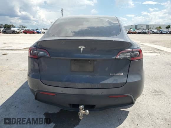 2022 Tesla Model Y Performance with VIN 7SAYGDEF9NF460112, listed as a Copart auction lot 60408264 with 22,186 mi miles and Salvage title. Bid and sale history available at DreamBid. Image 6.