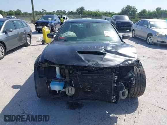 2021 Dodge Charger Scat Pack Widebody с VIN 2C3CDXGJ9MH561070, выставлен на аукционе IAAI как лот 42824700 с пробегом 62 984 миль миль и . История ставок и продаж доступна на DreamBid. Изображение 13.